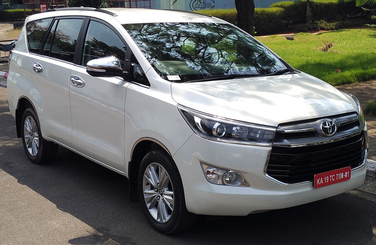 Toyota Innova Crysta 2.4 Z front right — model reference photo, not the supplied rental vehicle